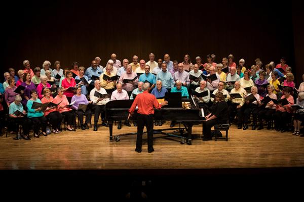 The OLLI at University of Kentucky Chorus performing in the Singletary Center at the University of Kentucky in Spring of 2019.