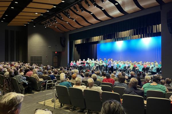 OLLI Chorus & The Hot Cookies Ukulele Group at Frederick Douglass High School Auditorium in April of 2024