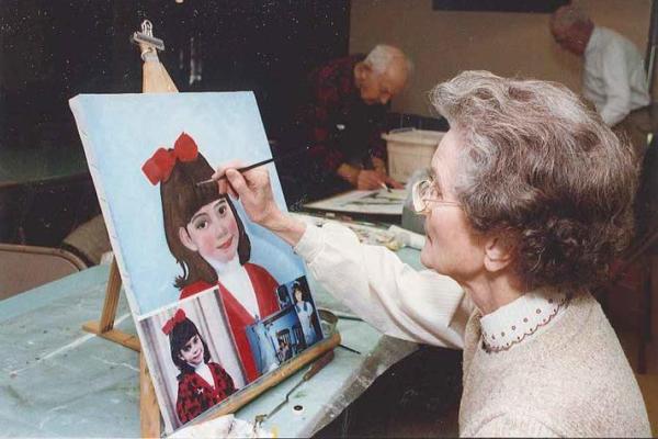 An early Donovan Scholar painting a portrait of a girl in a painting course. The Donovan Scholarship pays tuition and mandatory course fees for adults who are 65 years and older, taking academic courses at UK. Photo courtesy of UK Office for Lifelong Learning.